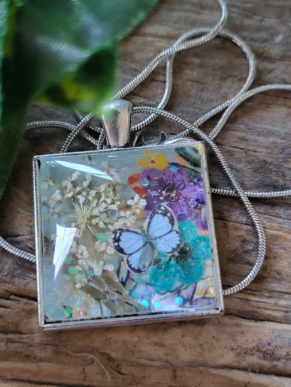 Silver Toned Butterfly & Floral  Necklace Under Glass